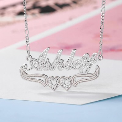 Collar personalizado con nombre de dos colores con decoración de corazón debajo